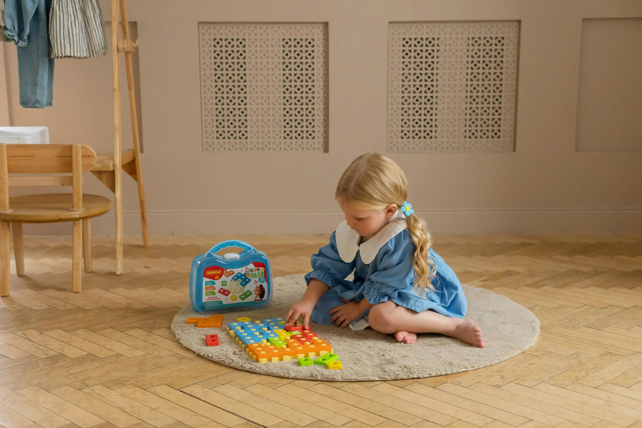 A girl plays with toys